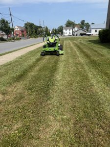 Lawn mowing service with zero turn mower by Justin's Lawn Service