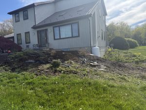 Residential landscape bed before mulch installation by Justin's Lawn Service